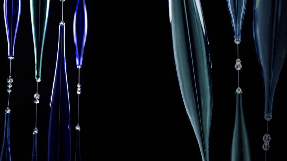 Colored glass elements for the fixtures